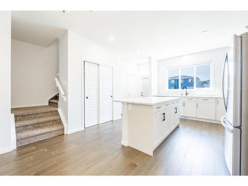 147 Dawson Harbour Hill, Chestermere, AB - Indoor Photo Showing Kitchen