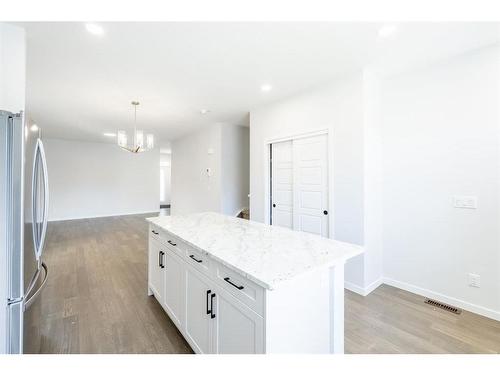 147 Dawson Harbour Hill, Chestermere, AB - Indoor Photo Showing Kitchen