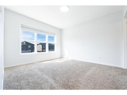 147 Dawson Harbour Hill, Chestermere, AB - Indoor Photo Showing Other Room