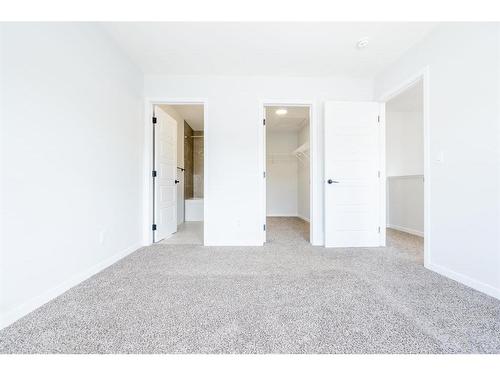 147 Dawson Harbour Hill, Chestermere, AB - Indoor Photo Showing Other Room