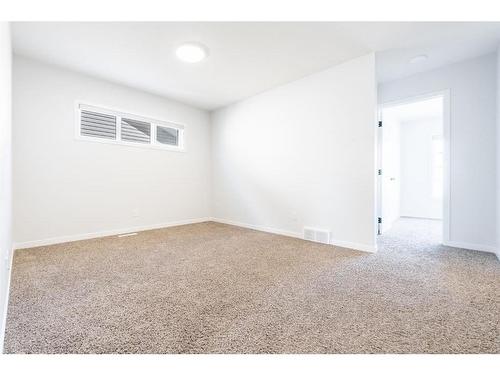 147 Dawson Harbour Hill, Chestermere, AB - Indoor Photo Showing Other Room