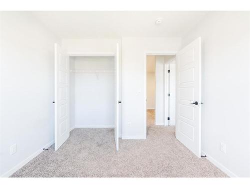 147 Dawson Harbour Hill, Chestermere, AB - Indoor Photo Showing Other Room