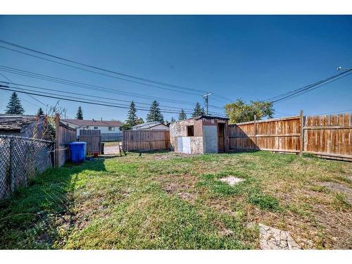 6043 8 Avenue Se, Calgary, AB - Outdoor With Backyard