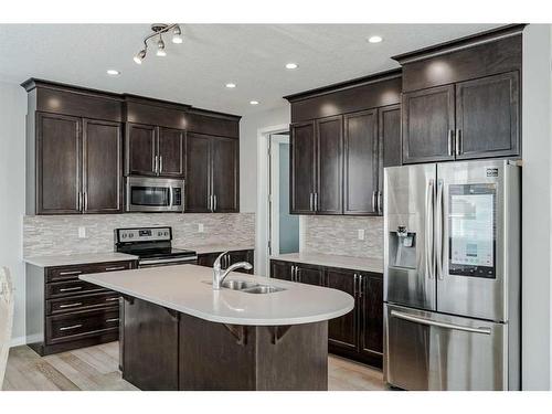 182 Cityside Common Ne, Calgary, AB - Indoor Photo Showing Kitchen With Stainless Steel Kitchen With Double Sink With Upgraded Kitchen