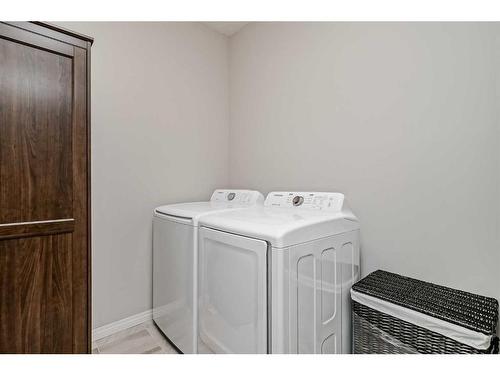 182 Cityside Common Ne, Calgary, AB - Indoor Photo Showing Laundry Room