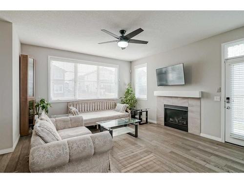 182 Cityside Common Ne, Calgary, AB - Indoor Photo Showing Living Room With Fireplace