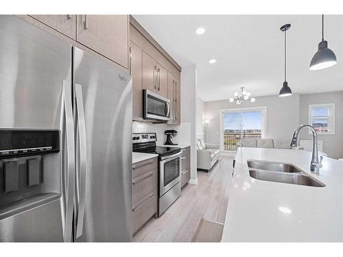 1244 Cornerstone Street Ne, Calgary, AB - Indoor Photo Showing Kitchen With Stainless Steel Kitchen With Double Sink With Upgraded Kitchen