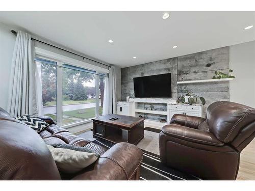 6424 18 Street Se, Calgary, AB - Indoor Photo Showing Living Room With Fireplace