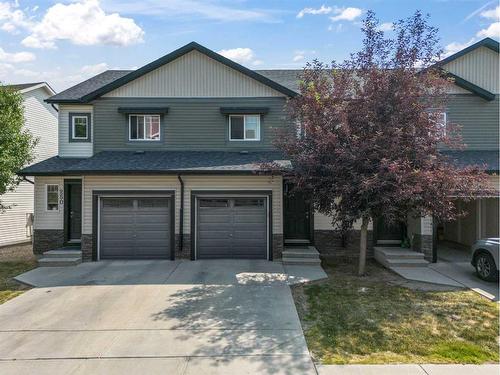 252 Pantego Lane Nw, Calgary, AB - Outdoor With Facade