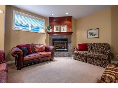 51 Cranleigh Mews Se, Calgary, AB - Indoor Photo Showing Living Room With Fireplace