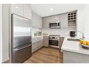 515-301 10 Street Nw, Calgary, AB  - Indoor Photo Showing Kitchen With Stainless Steel Kitchen With Double Sink With Upgraded Kitchen 