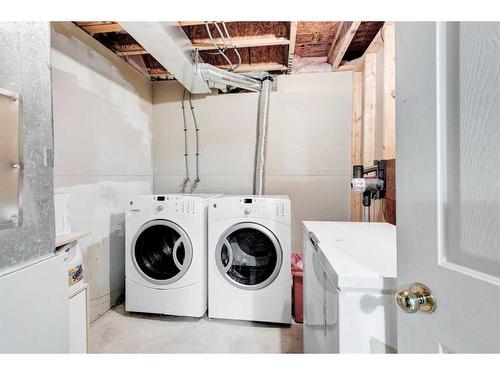 171 Bridlewood Common Sw, Calgary, AB - Indoor Photo Showing Laundry Room