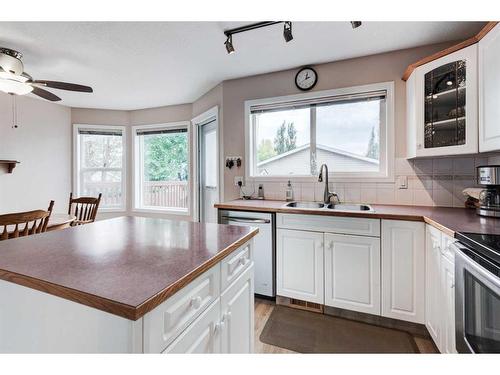 171 Bridlewood Common Sw, Calgary, AB - Indoor Photo Showing Kitchen With Double Sink