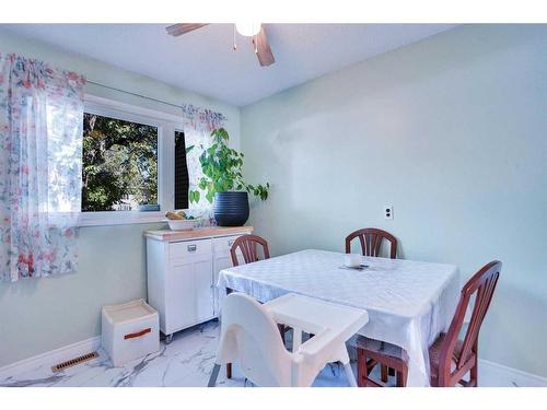 1-7524 Bowness Road Nw, Calgary, AB - Indoor Photo Showing Dining Room