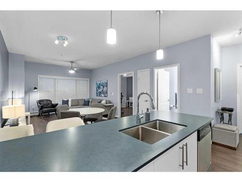 310-4403A 67A Avenue, Olds, AB - Indoor Photo Showing Kitchen With Double Sink