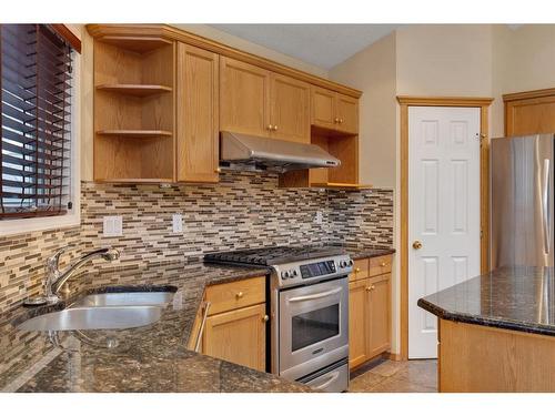 138 Sienna Heights Way Sw, Calgary, AB - Indoor Photo Showing Kitchen With Double Sink