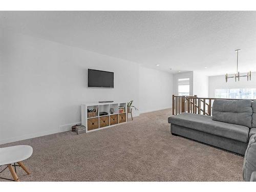 307 Chelsea Passage, Chestermere, AB - Indoor Photo Showing Living Room