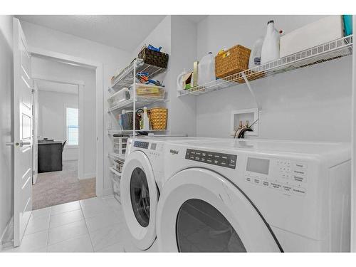 307 Chelsea Passage, Chestermere, AB - Indoor Photo Showing Laundry Room