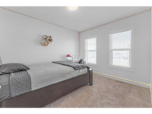 307 Chelsea Passage, Chestermere, AB - Indoor Photo Showing Bedroom