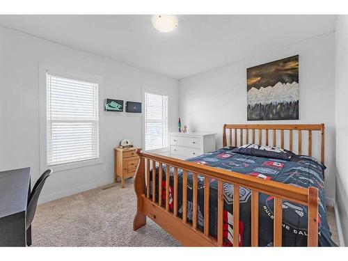 307 Chelsea Passage, Chestermere, AB - Indoor Photo Showing Bedroom