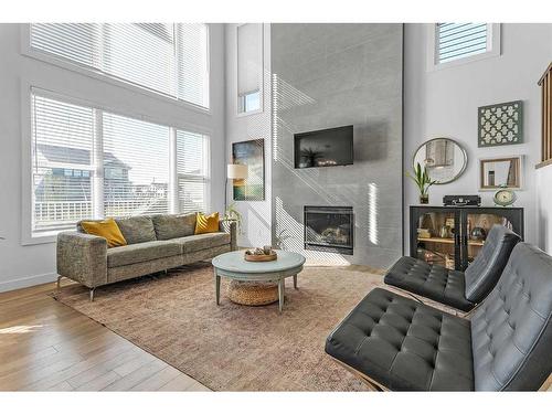 307 Chelsea Passage, Chestermere, AB - Indoor Photo Showing Living Room With Fireplace