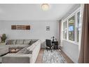 274 Aquila Drive Nw, Calgary, AB  - Indoor Photo Showing Living Room 