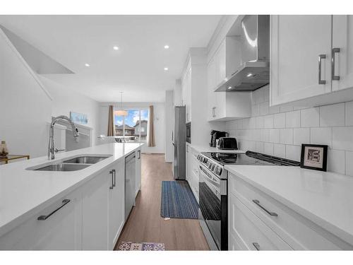 274 Aquila Drive Nw, Calgary, AB - Indoor Photo Showing Kitchen With Double Sink With Upgraded Kitchen