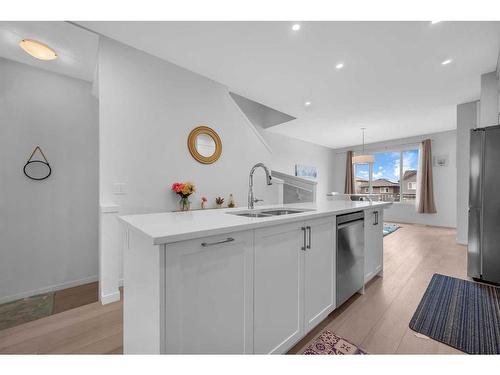 274 Aquila Drive Nw, Calgary, AB - Indoor Photo Showing Kitchen With Double Sink