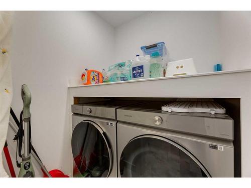 137 Arbour Crest Road Nw, Calgary, AB - Indoor Photo Showing Laundry Room