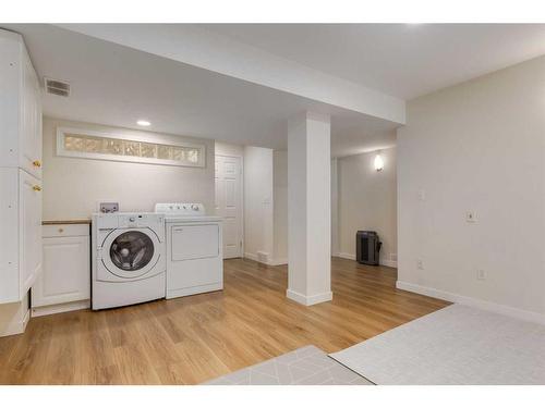 137 Arbour Crest Road Nw, Calgary, AB - Indoor Photo Showing Laundry Room