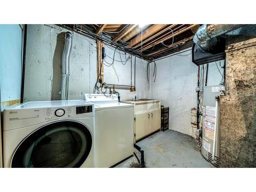 3715 Valdes Place Nw, Calgary, AB - Indoor Photo Showing Laundry Room