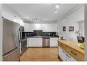 203 Edgedale Gardens Nw, Calgary, AB  - Indoor Photo Showing Kitchen 