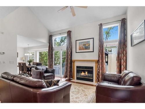 203 Edgedale Gardens Nw, Calgary, AB - Indoor Photo Showing Living Room With Fireplace