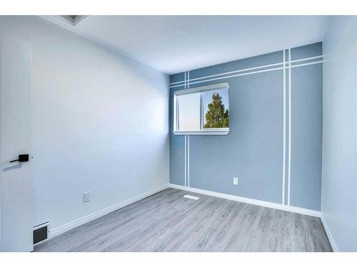 7994 Laguna Way Ne, Calgary, AB - Indoor Photo Showing Other Room