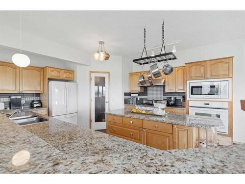 386109 128 Street West, Rural Foothills County, AB - Indoor Photo Showing Kitchen With Double Sink