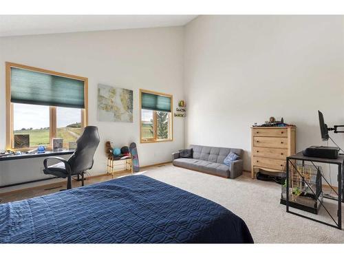 386109 128 Street West, Rural Foothills County, AB - Indoor Photo Showing Bedroom