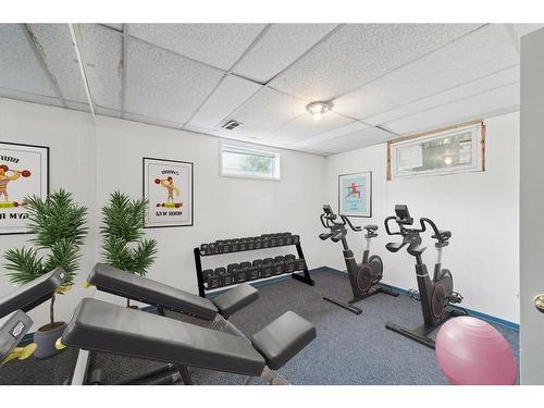 2407 37 Street Se, Calgary, AB - Indoor Photo Showing Gym Room