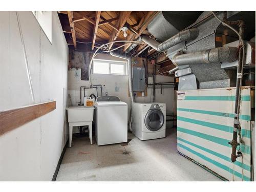 2407 37 Street Se, Calgary, AB - Indoor Photo Showing Laundry Room