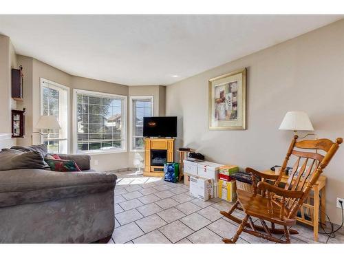 108 Martinglen Mews Ne, Calgary, AB - Indoor Photo Showing Living Room With Fireplace