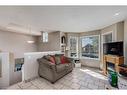 108 Martinglen Mews Ne, Calgary, AB  - Indoor Photo Showing Living Room 