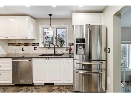 6607 Bow Crescent Nw, Calgary, AB - Indoor Photo Showing Kitchen With Stainless Steel Kitchen With Double Sink