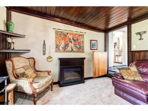 6607 Bow Crescent Nw, Calgary, AB - Indoor Photo Showing Living Room With Fireplace