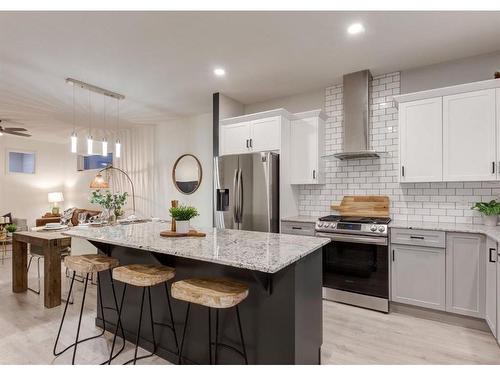 11 Seton Gardens Se, Calgary, AB - Indoor Photo Showing Kitchen With Upgraded Kitchen