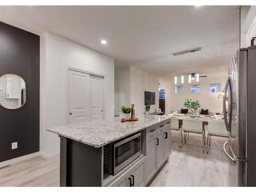 11 Seton Gardens Se, Calgary, AB - Indoor Photo Showing Kitchen With Upgraded Kitchen