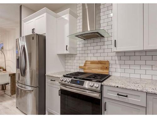 11 Seton Gardens Se, Calgary, AB - Indoor Photo Showing Kitchen With Upgraded Kitchen