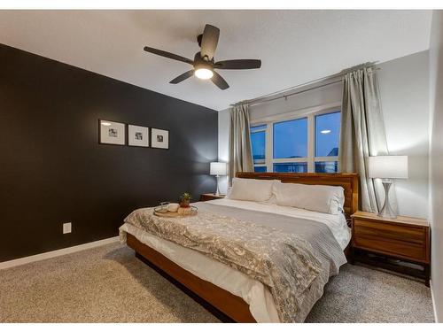 11 Seton Gardens Se, Calgary, AB - Indoor Photo Showing Bedroom