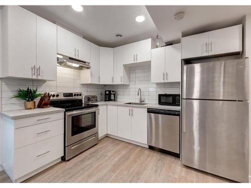 11 Seton Gardens Se, Calgary, AB - Indoor Photo Showing Kitchen