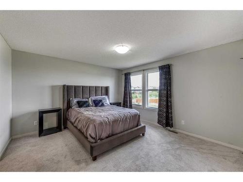 50 Silverado Skies Drive Sw, Calgary, AB - Indoor Photo Showing Bedroom