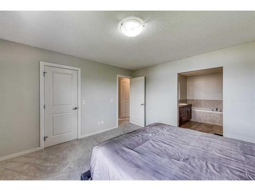 50 Silverado Skies Drive Sw, Calgary, AB - Indoor Photo Showing Bedroom