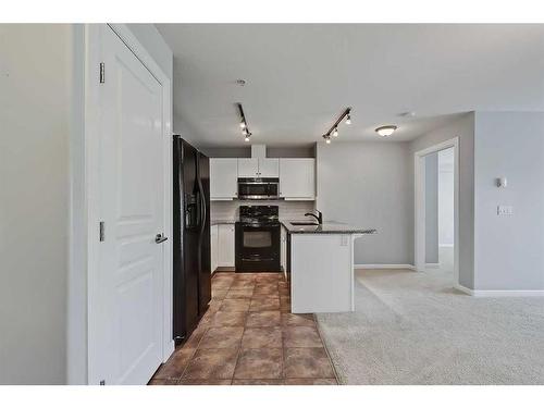 213-30 Cranfield Link Se, Calgary, AB - Indoor Photo Showing Kitchen